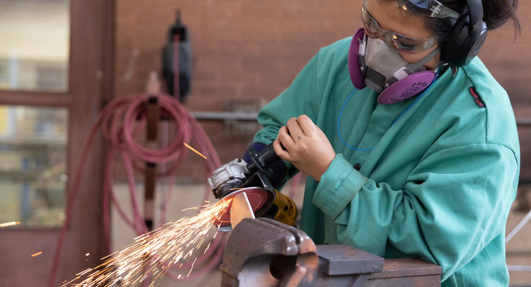 CVPA student doing grinder work