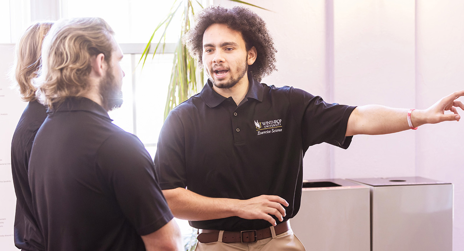 3 people from Exercise Science having a discussion