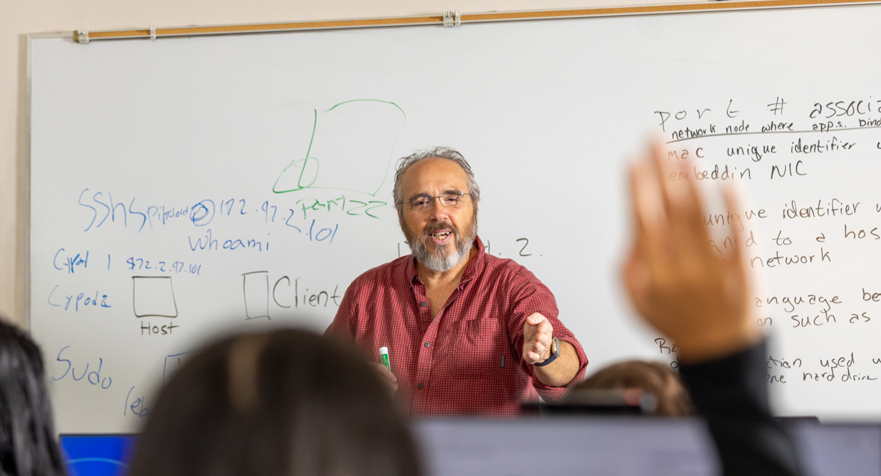 Professor takes questions in classroom