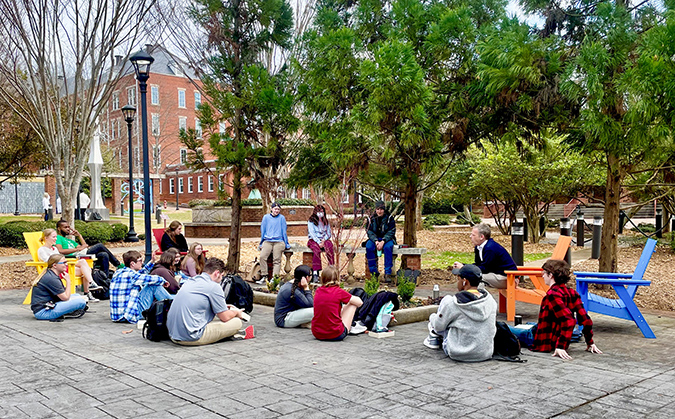 A class being held in Hardin Family Garden