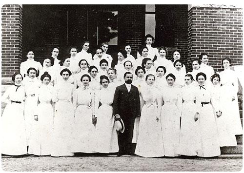 Historical photo of a group of students with D.B. Johnson