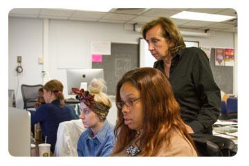 Professor working with students