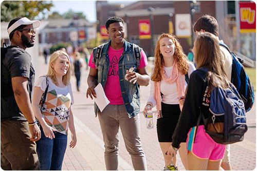 Students talking on Scholars Walk