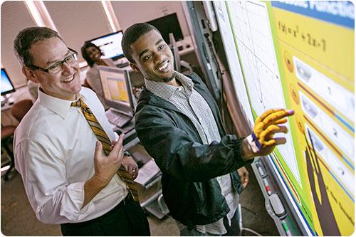 Student and professor discussing problem