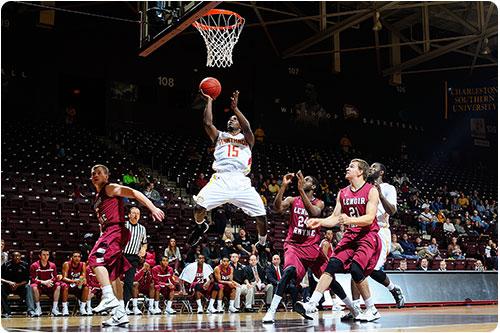 Basketball team playing during game