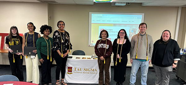 group photo of students being inducted into Tau Sigma