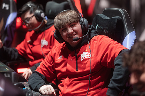 A Winthrop League of Legends player smiles at a teammate during a tournament break