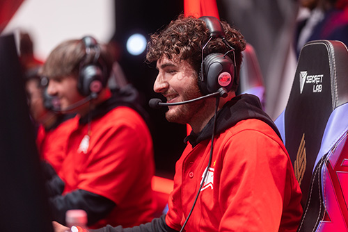 A Winthrop League of Legends player smiles during a tournament