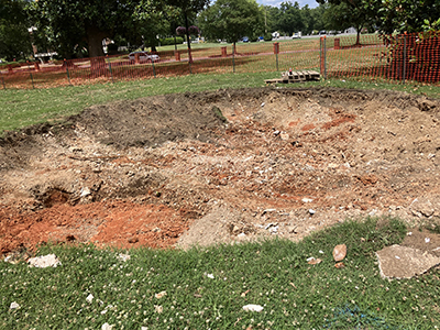 a photo of the empty ground after the demolition of the old fountain is complete