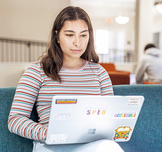A student on her laptop