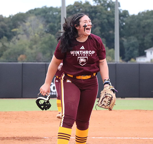 Winthrop women's softball player on the field.