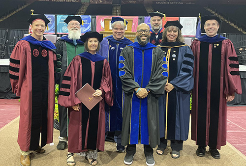 group photo of faculty in regalia