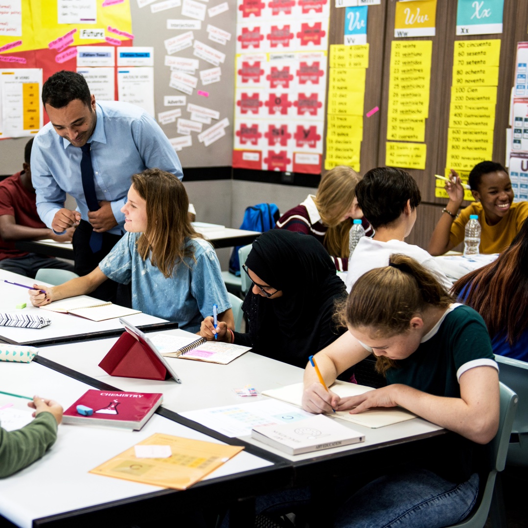 Teacher talking with student