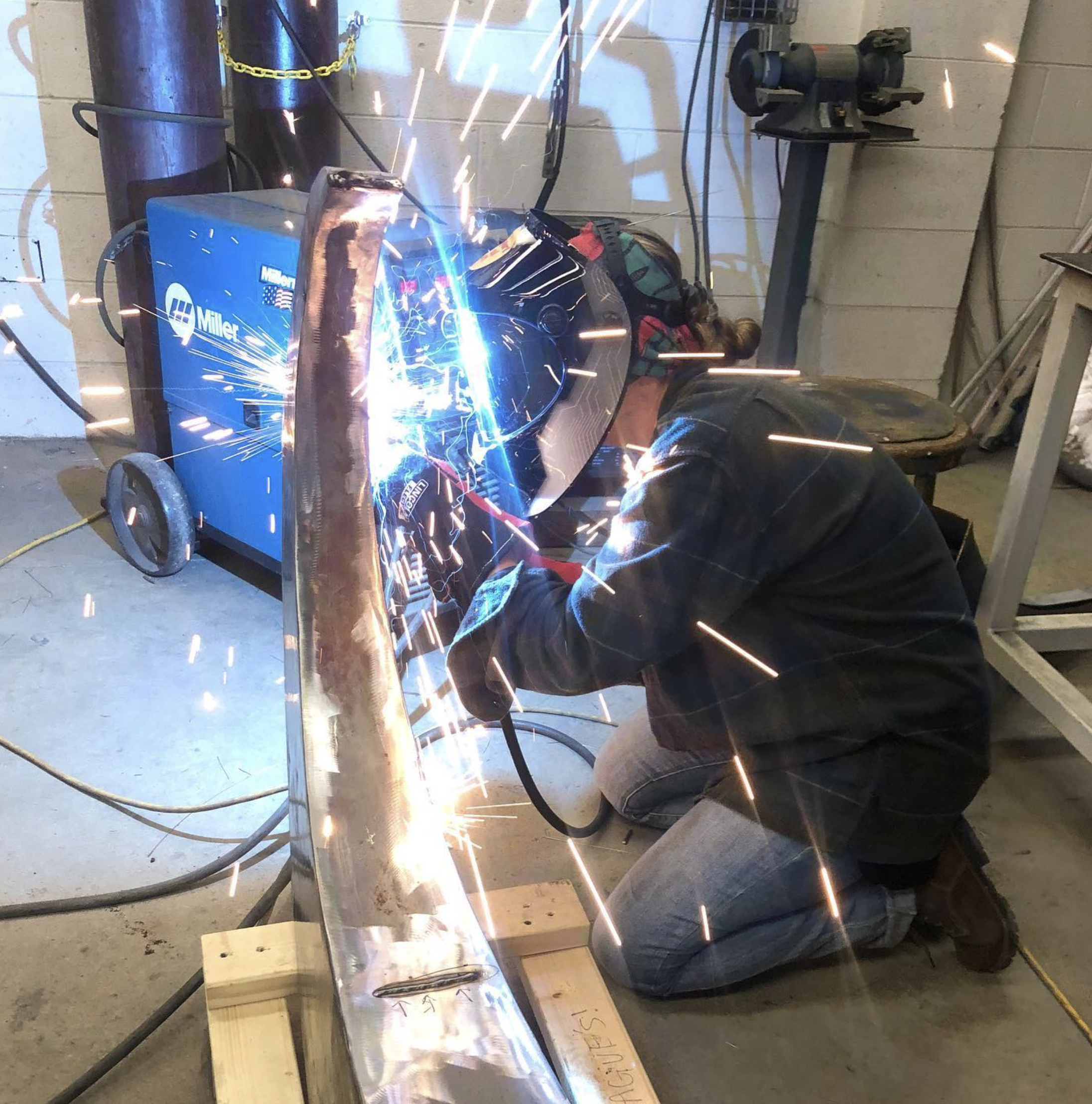 Artist Lauren Grad welding