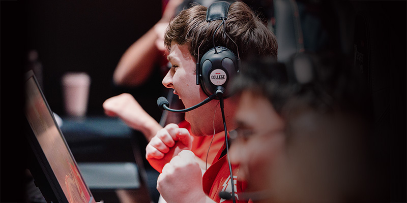 esports player cheering after winning a game