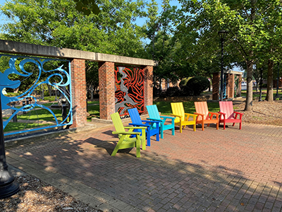 colorful set-up of new Adirondack chairs in Hardin Garden