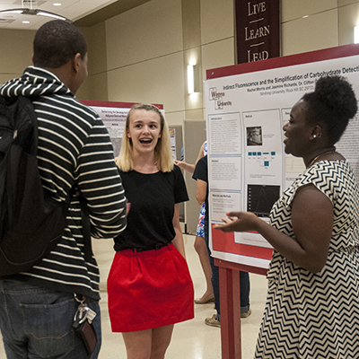 Student presenting research