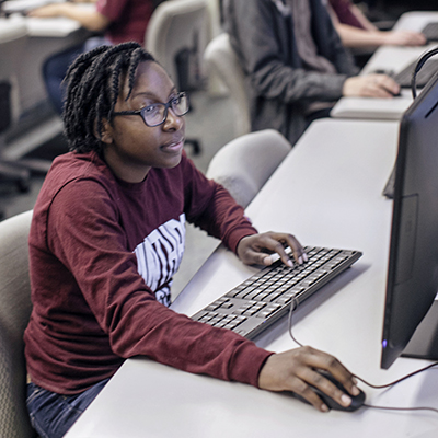 Student using computer in lab