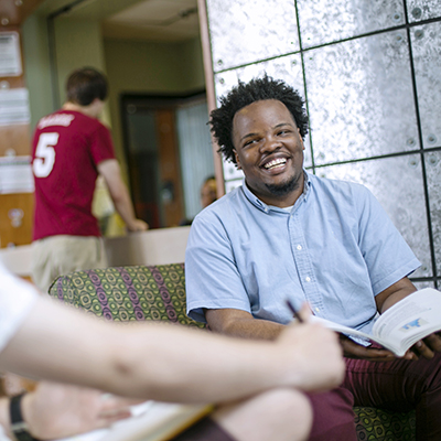 Student laughing in study group