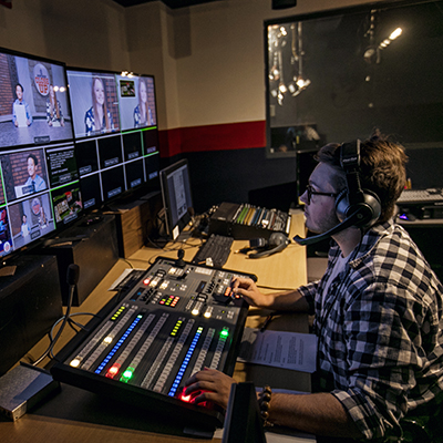 student working in control room