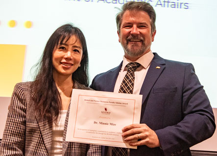 Minnie Mize and Provost Sebastian van Delden