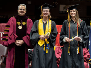 President Serna, from left, Sarah Barnet and Haley Duggan