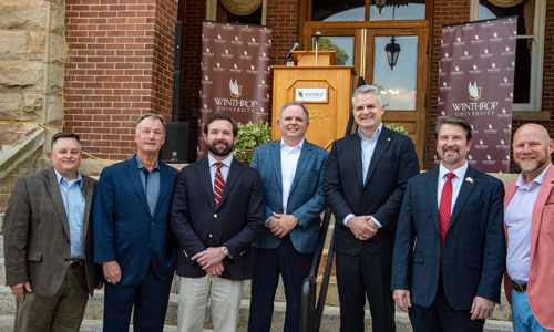 Partners for the hub include, from left, John Blomberg, Small Business Development Center; John Barnes, Comporium; Winthrop BOT Chair Joel Hamilton; Mitch Smith, SC Research Authority; President Edward Serna; Provost Sebastian van Delden; Bob Alexander, RH Economic Development Center