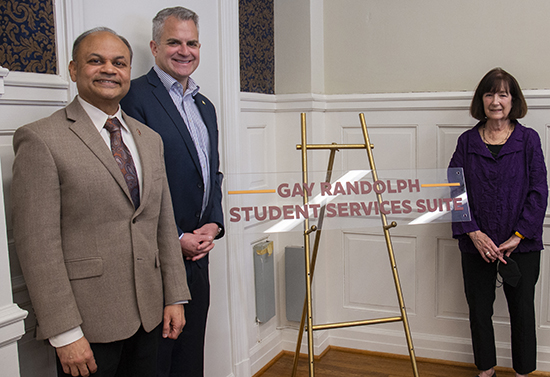 From left: Business Dean P.N. Saksena, President Edward Serna, and Gay Randolph