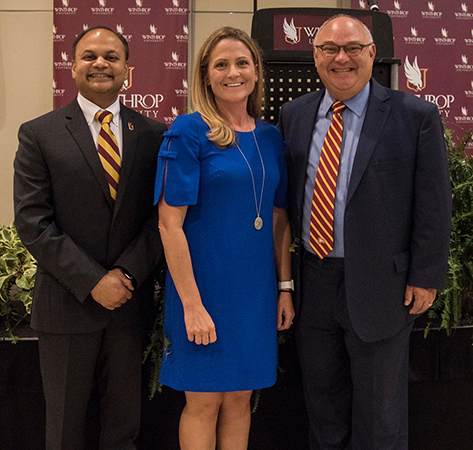 From left: CBA Dean P.N. Saksena, economist Laura Ullrich, and Mark Vitner