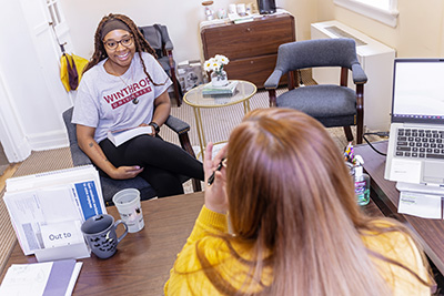 a student meeting with the Student Services office in the College of Business and
                     Technology