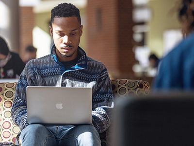 a student using a laptop