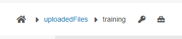 a screenshot of a breadcrumb path showing uploadedFiles and the training folder